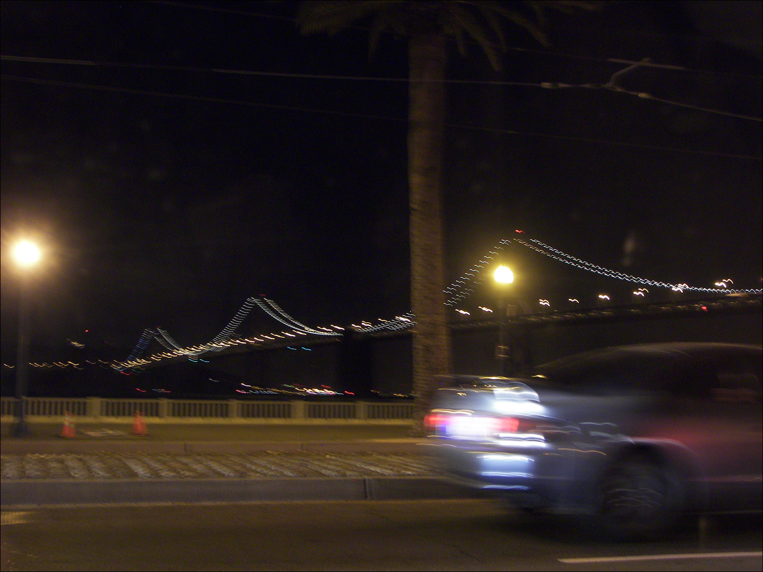 Nighttime views of SF from Embarcadero as we head towards the Bay bridge.