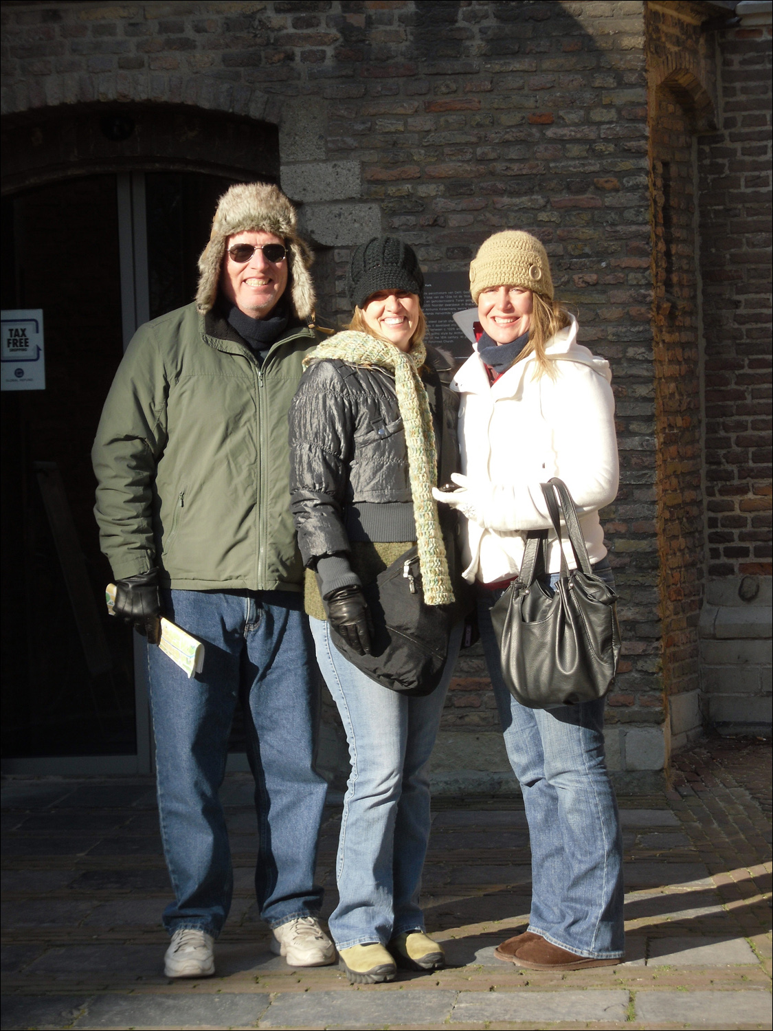L-R Bob, Sondra, and Becky near the entrance to Oude Kerk