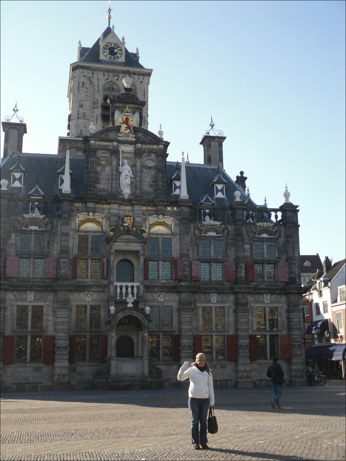 Becky in front of the city hall building in Delft