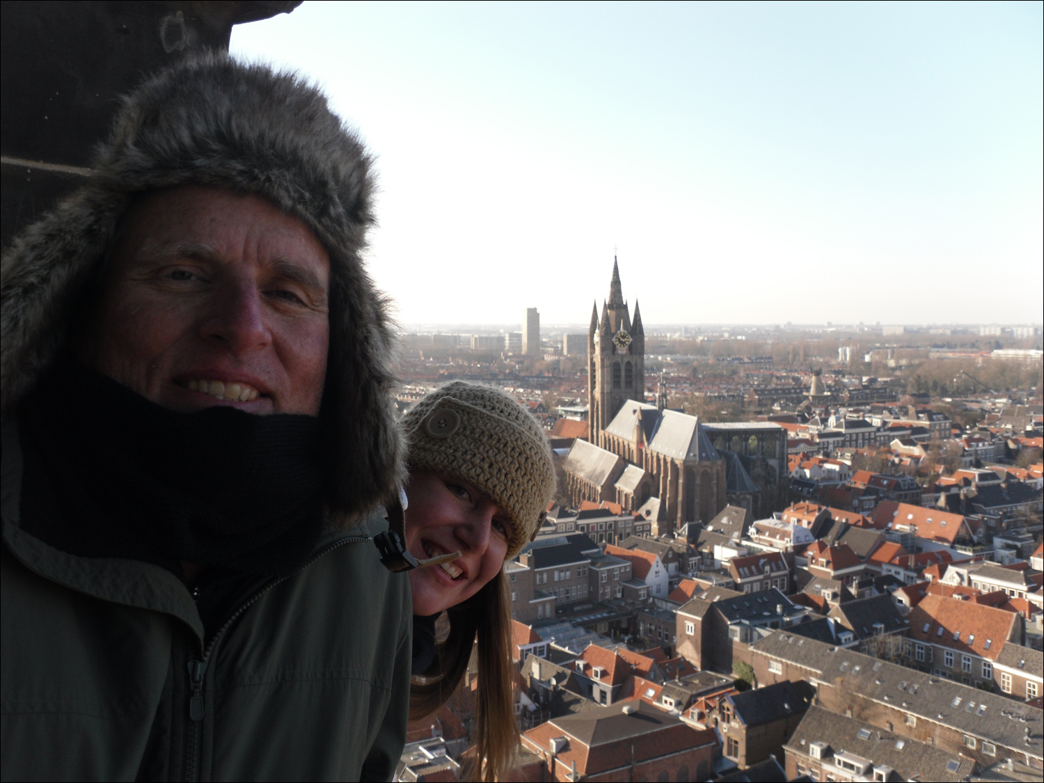 Views from the top of the clock tower on Nieuwe Kerk- Oude Kerk in background-Bob and Becky