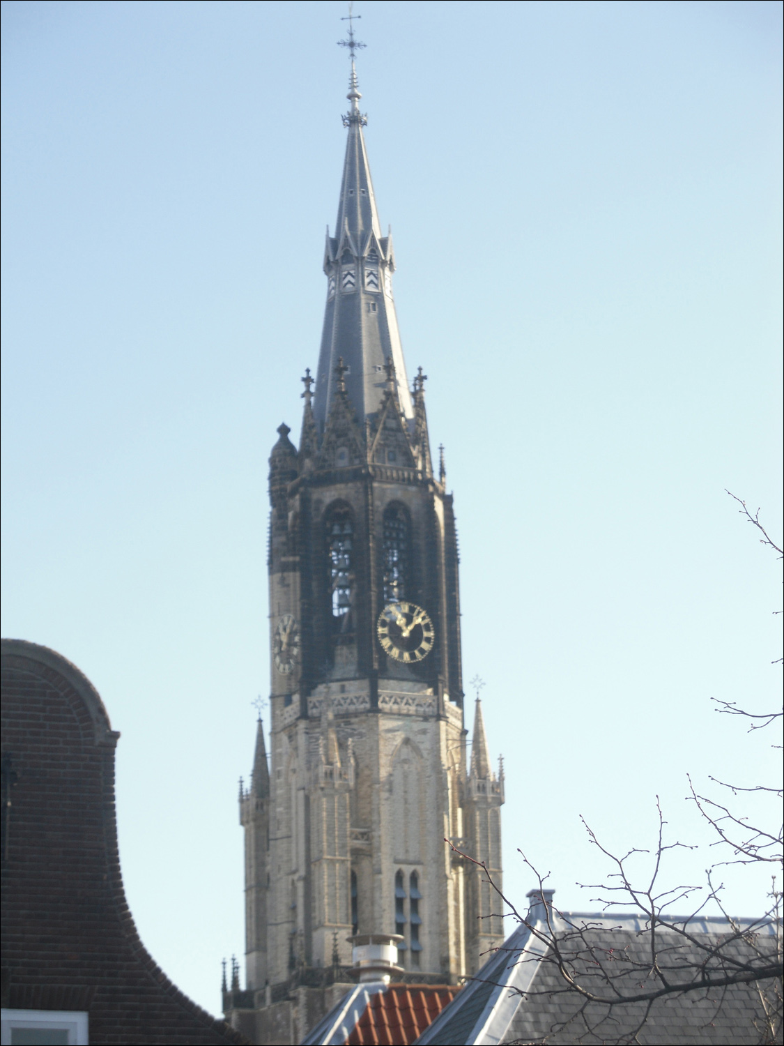 Clock tower of Nieuwe Kerk as seen from Delft house
