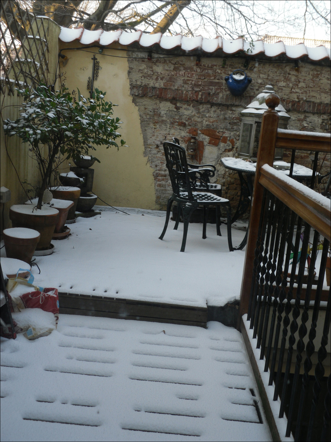 Outside patio of Delft house after snow