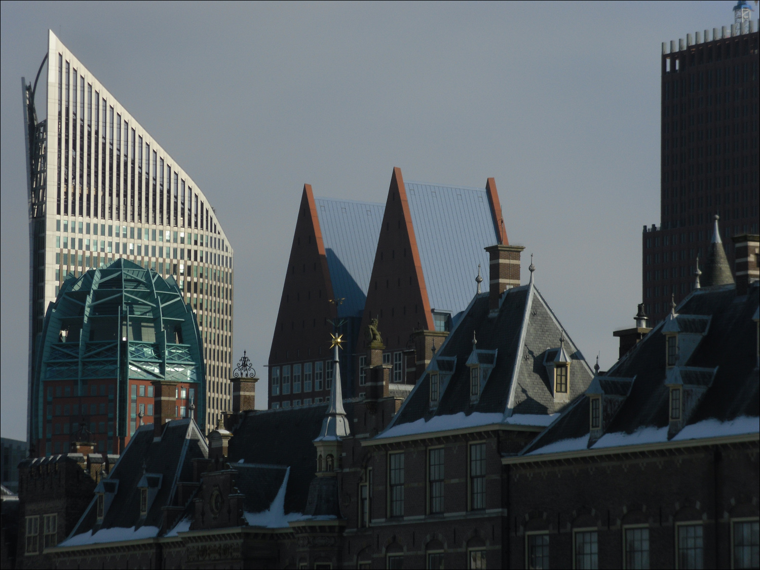 Hague-Binnenhof roofline in front of modern skyline